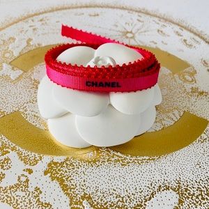 CHANEL Magenta Color With Blue Embossed Lettering